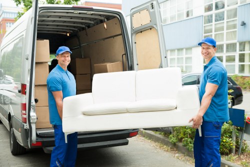 Moving boxes and furniture prepared for a Muswell Hill removal service