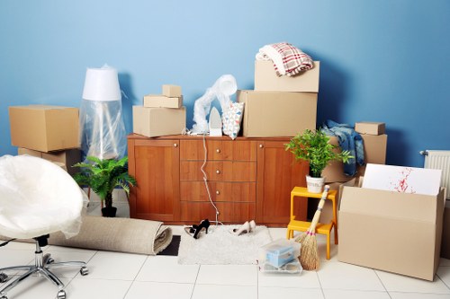 Boxes and packaging being flattened and separated for recycling
