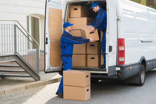 Commercial removal specialists transporting office furniture safely