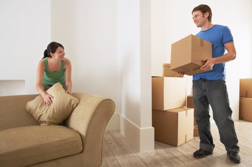Professional removal team loading furniture for same day relocation in Muswellhill